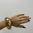 bracciale con dettaglio oro sul davanti shine